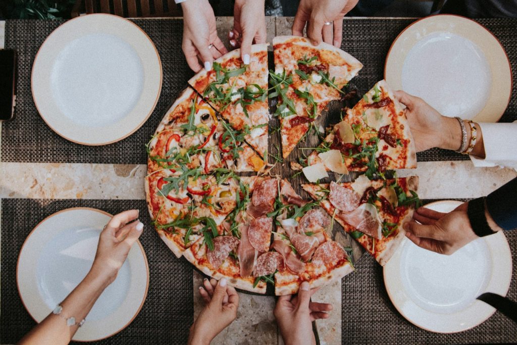 pizza on white ceramic plate